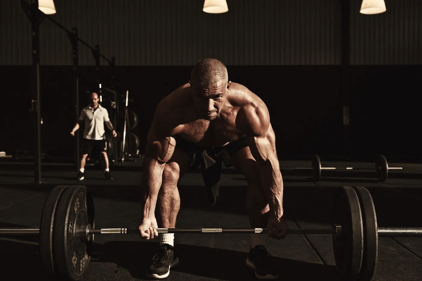 Man in his forties setting up a deadlift